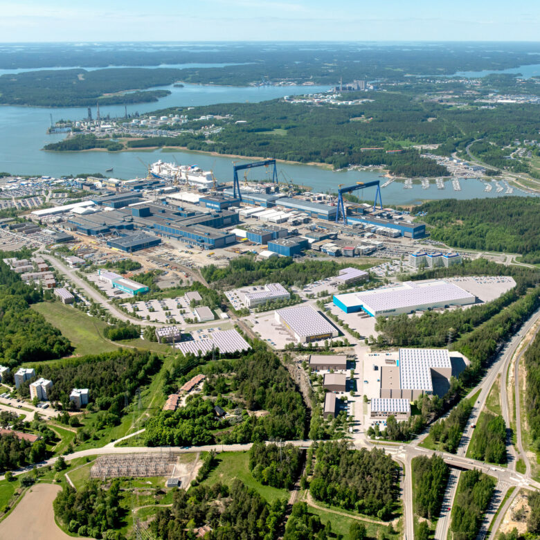 Meyer Turku Shipyard and conceptual drawing of new buildings.